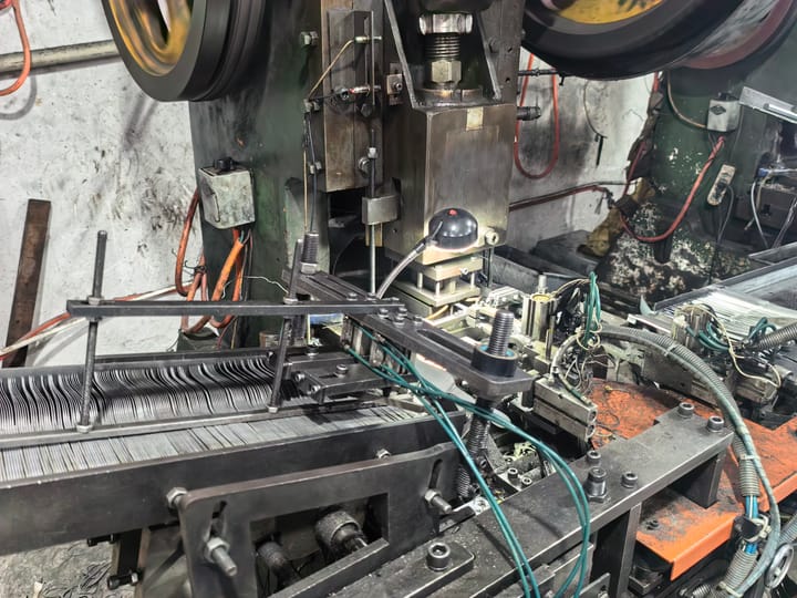 Transfer tooling and safety-guarded feed mechanism