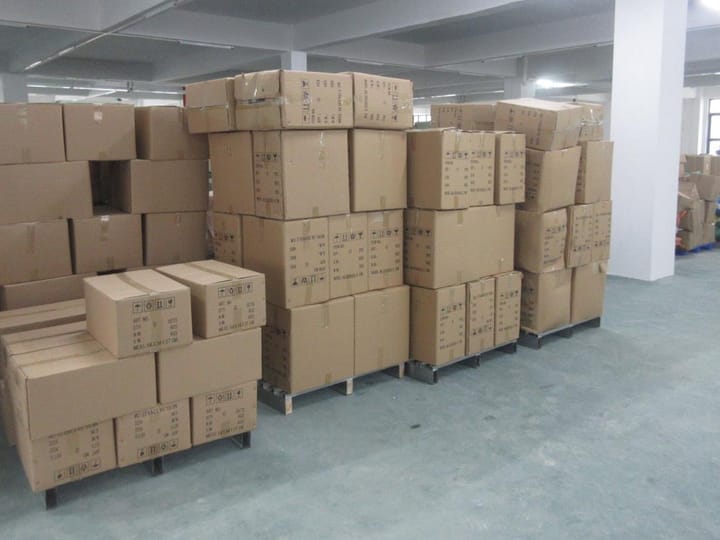 Packed cartons on pallets in the finished goods area