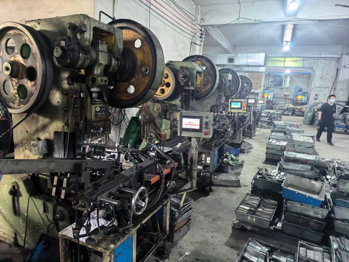Flywheel and drive train of a mechanical press