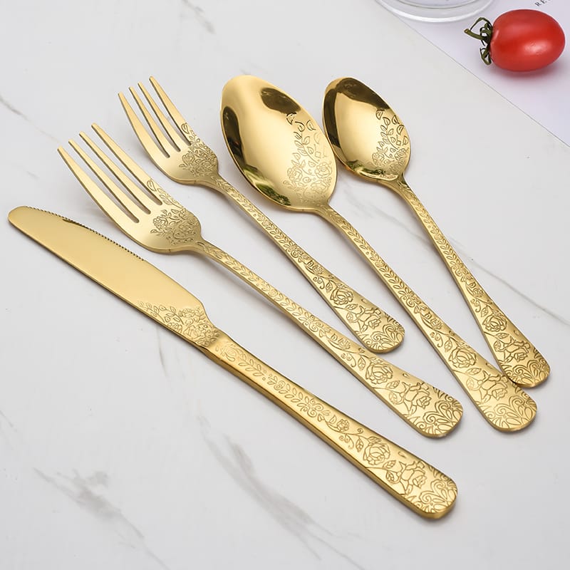 Rose pattern flatware set in gold finish