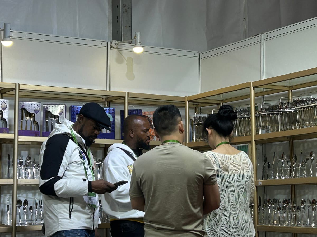 Buyers reviewing stainless steel flatware samples