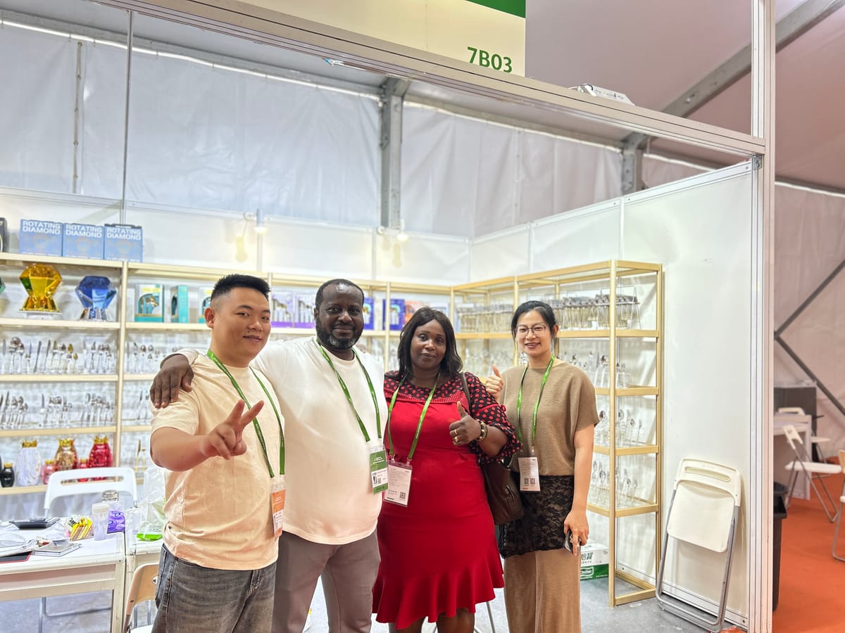 Team with clients at Canton Fair booth
